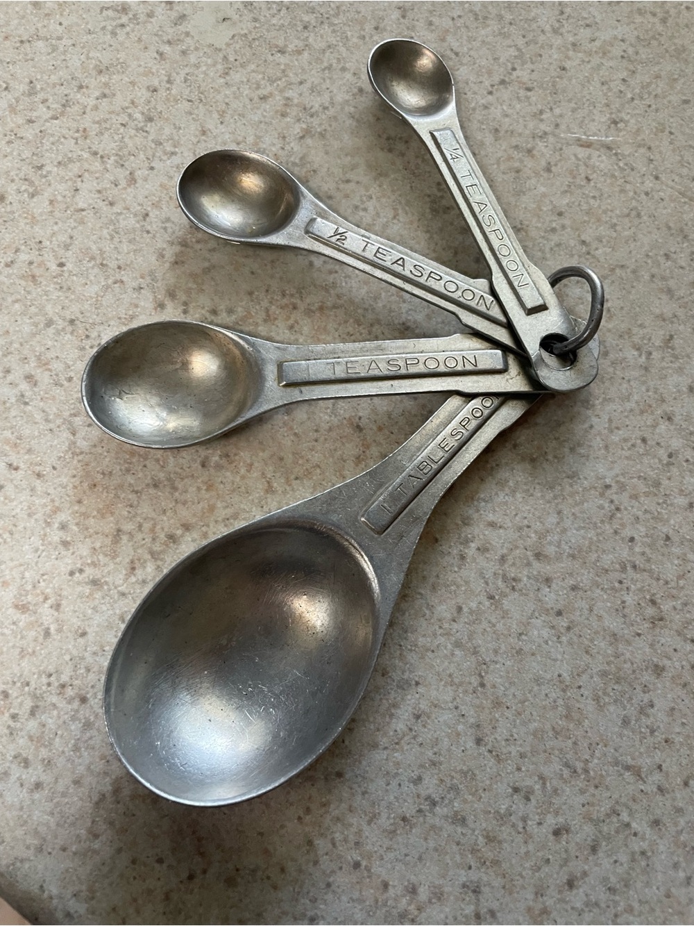 Vintage U.S.ST'D Aluminum Metal Measuring Spoons Oval Nesting Set of 4 on Ring